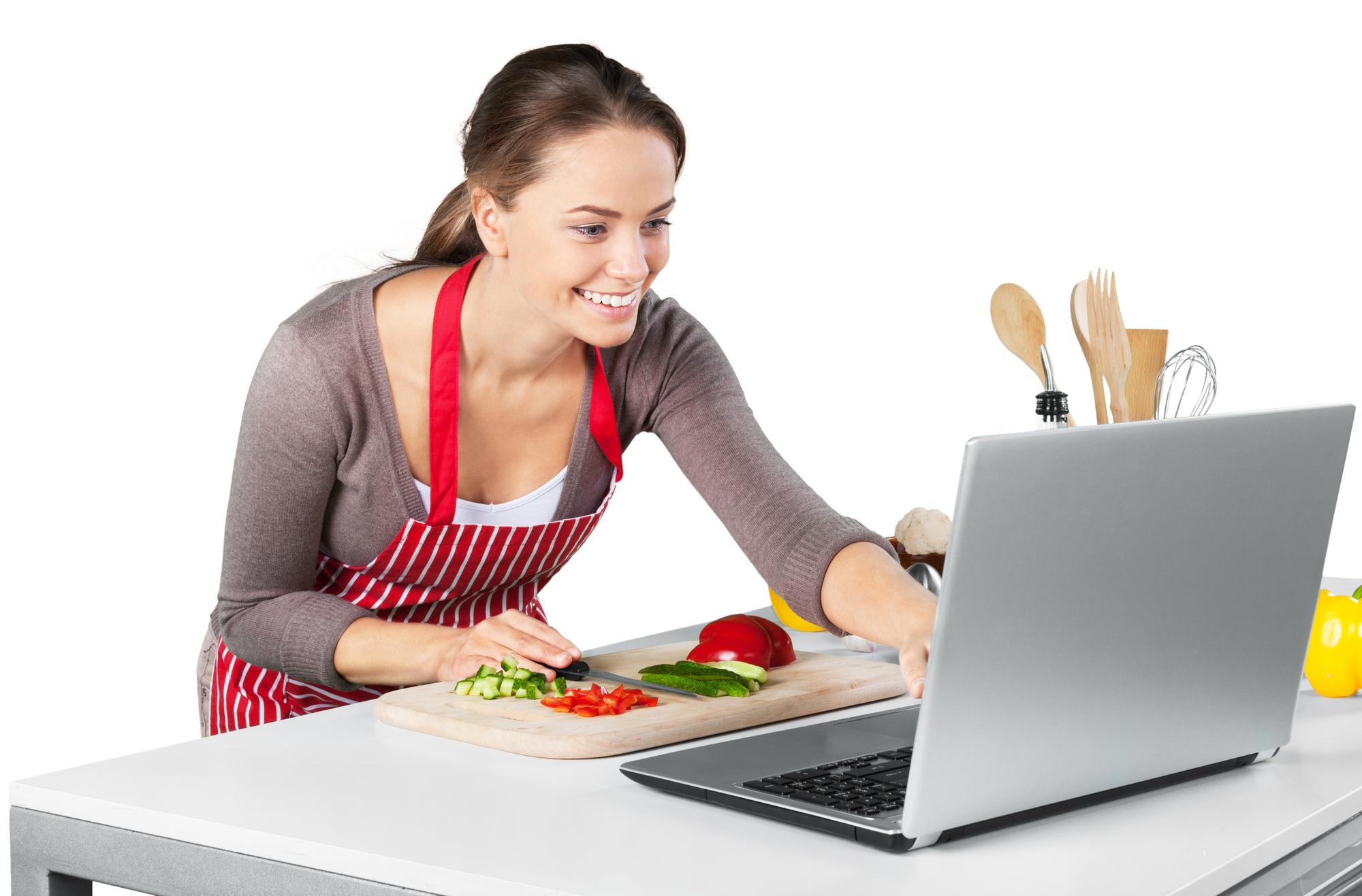 Happy student cooking with laptop